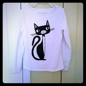 White top with tuxedo cat. Size 8. Runs small.